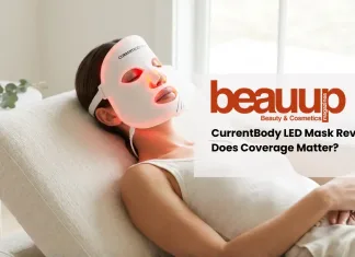 CurrentBody Skin LED Mask Review: Does Seamless Coverage Matter? Editorial photo of relaxed woman wearing glowing red light currentbody led mask in luxury home setting.