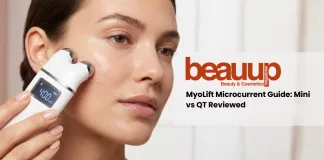 he device is held by a hand with an immaculate, minimalist manicure