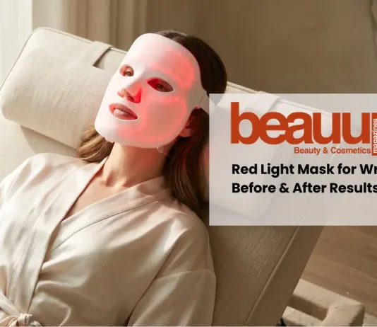 Woman wearing an LED face mask for wrinkles with a soft red glow in a luxury minimalist setting.