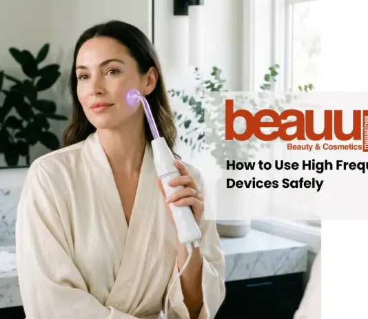 How to Use a High Frequency Wand at Home (Without Damaging Your Skin) A serene editorial photograph of a woman using a luxury high frequency wand at home.